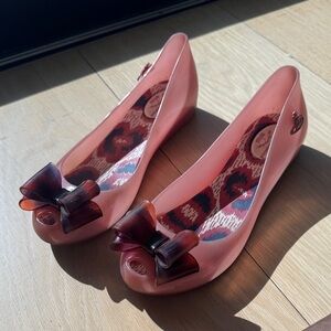 Vivienne Westwood shoes see photos pink with bow and orb detail size 9 used